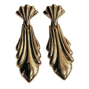 Vintage gold colored door knocker style clip earrings.